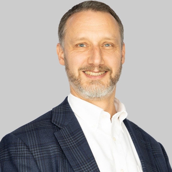 Headshot of Andrej Divis